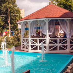 Pool gazebo with textiles and furniture - completed project Wood Luxury